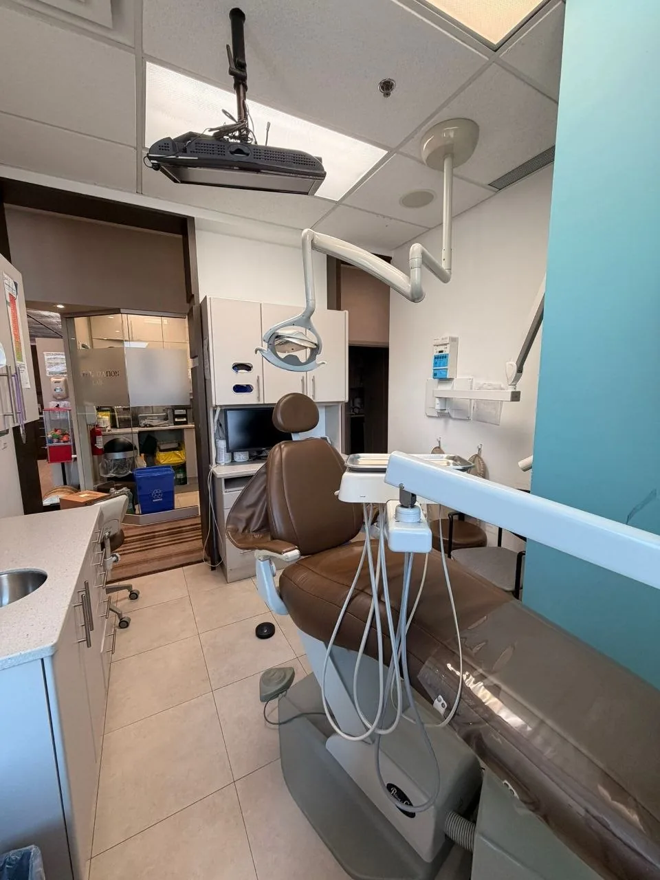 Close view of a dental chair and operatory equipment